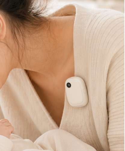 Wearable camera device clipped to parent's clothing